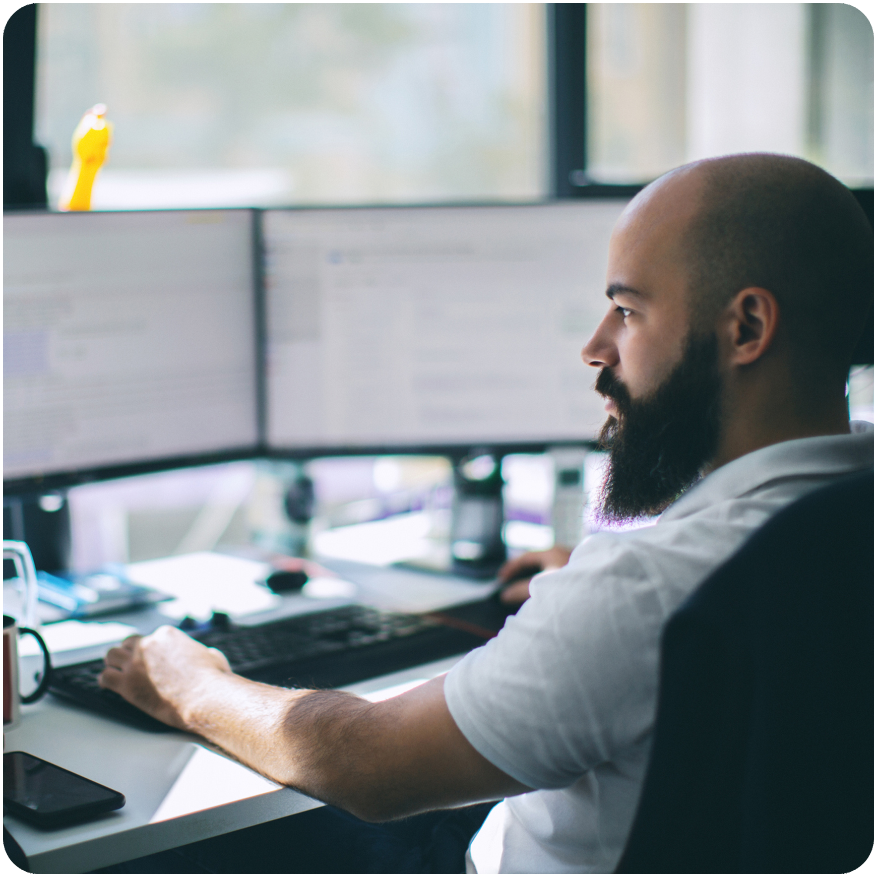 digital accessibility professional working at desk