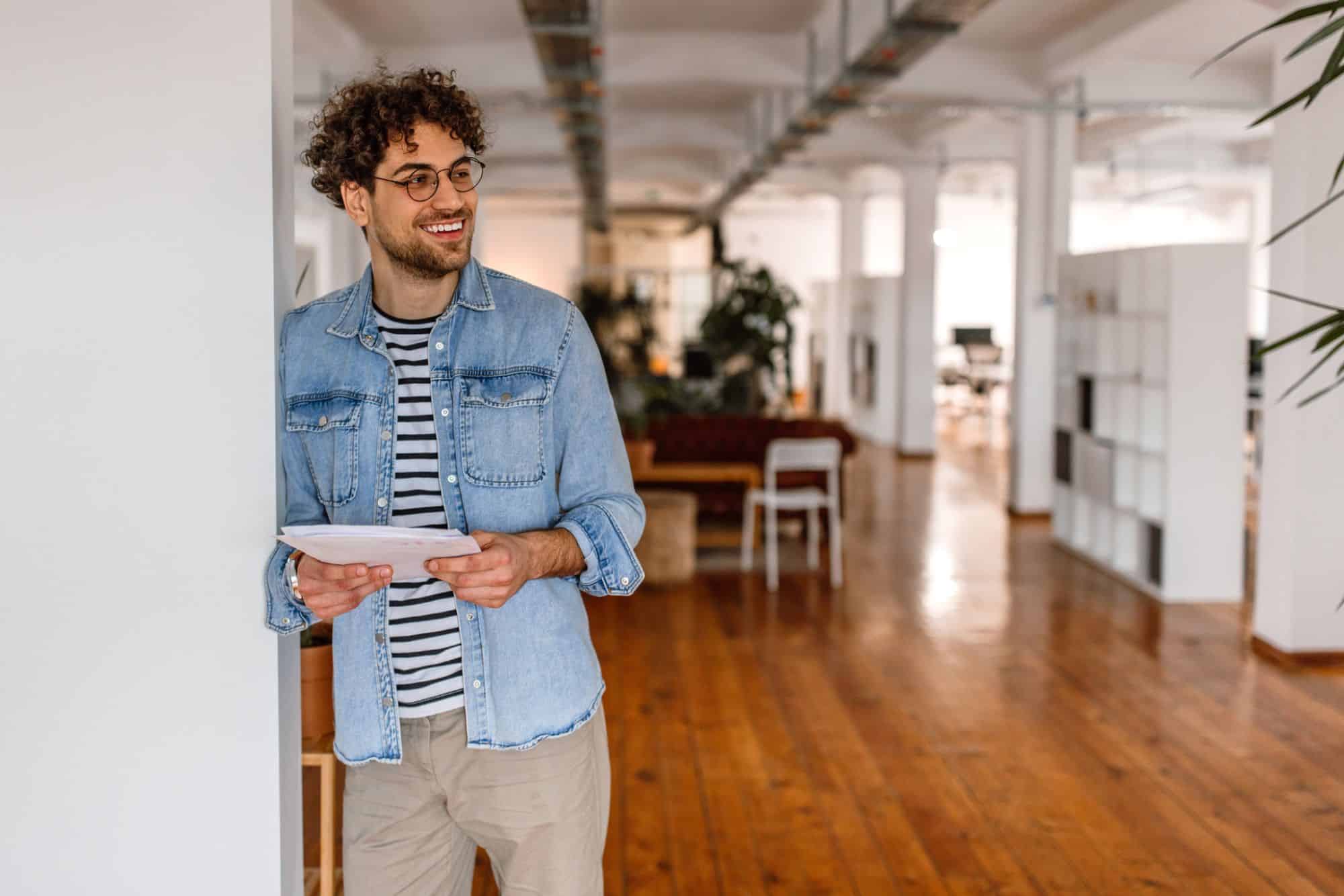 Content & writing expert standing in content staffing office
